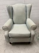 A wingback armchair by Next