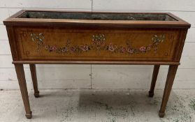 An Edwardian mahogany plant trough, Sheraton revival, the moulded edge housing a Zinc liner, the