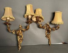 A pair of French gilt two armed wall sconces