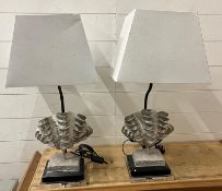 A pair of table lamps with shell details