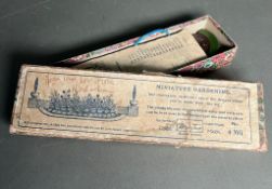 Britain's miniature gardening 4MG 1931 -36, comprising of flower bed, garden walls and flower urns