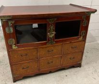 An oriental table cabinet, lacquered and metal furniture
