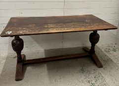 An English oak Jacobean revival refectory table on turned baluster supports (H73cm W152cm D74cm)