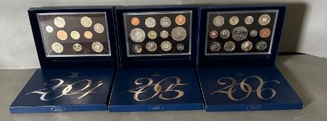 Three UK proof coin collectors packs 2004, 2005 and 2006
