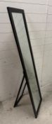 A black framed easel backed bedroom mirror 40cm x 158cm