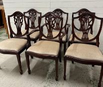 A set of six Georgian style dining chairs to include two carvers