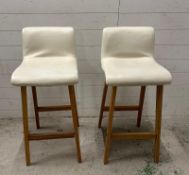 A pair of John Lewis faux cream leather high backed bar stools