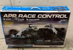 A Scalextric Arc one Formula one track and cars