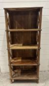 A hardwood four shelf shelving unit with X frame sides AF (H146cm W60cm D29cm)
