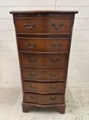 A George III style mahogany serpentine fronted six drawer tall boy (H100cm W48cm D40cm)
