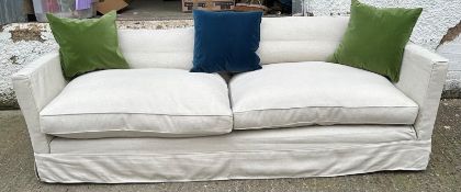 The Conran Shop, a large cream linen three seater sofa (H86cm W240cm D110cm SH44cm) (scatter