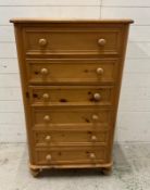 A pine six drawer tall boy (H140cm W66cm D40cm)