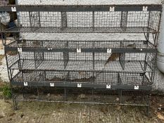 Three low industrial numbered metal school pigeon holes on hair pin legs