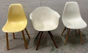Four vacuum form chairs in the manner of Herman Miller for Eames
