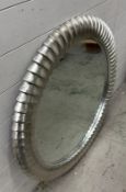 A contemporary circular silver painted hall mirror (Dia 101cm)