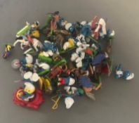 A quantity to toy figures, mostly Smurffs and some soldiers