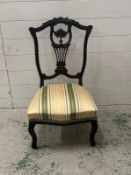 A low Edwardian style lyre backed dressing table chair.