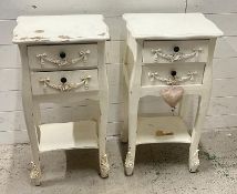 A pair of white bedsides, two drawers to front (H76cm W40cm D34cm)
