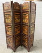 A substantial Indian hardwood screen or room divider painted with rural Indian scenes featuring