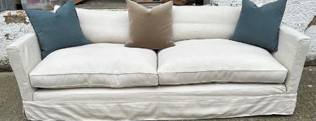 The Conran Shop, a large cream linen three seater sofa (H86cm W240cm D110cm SH44cm) (scatter