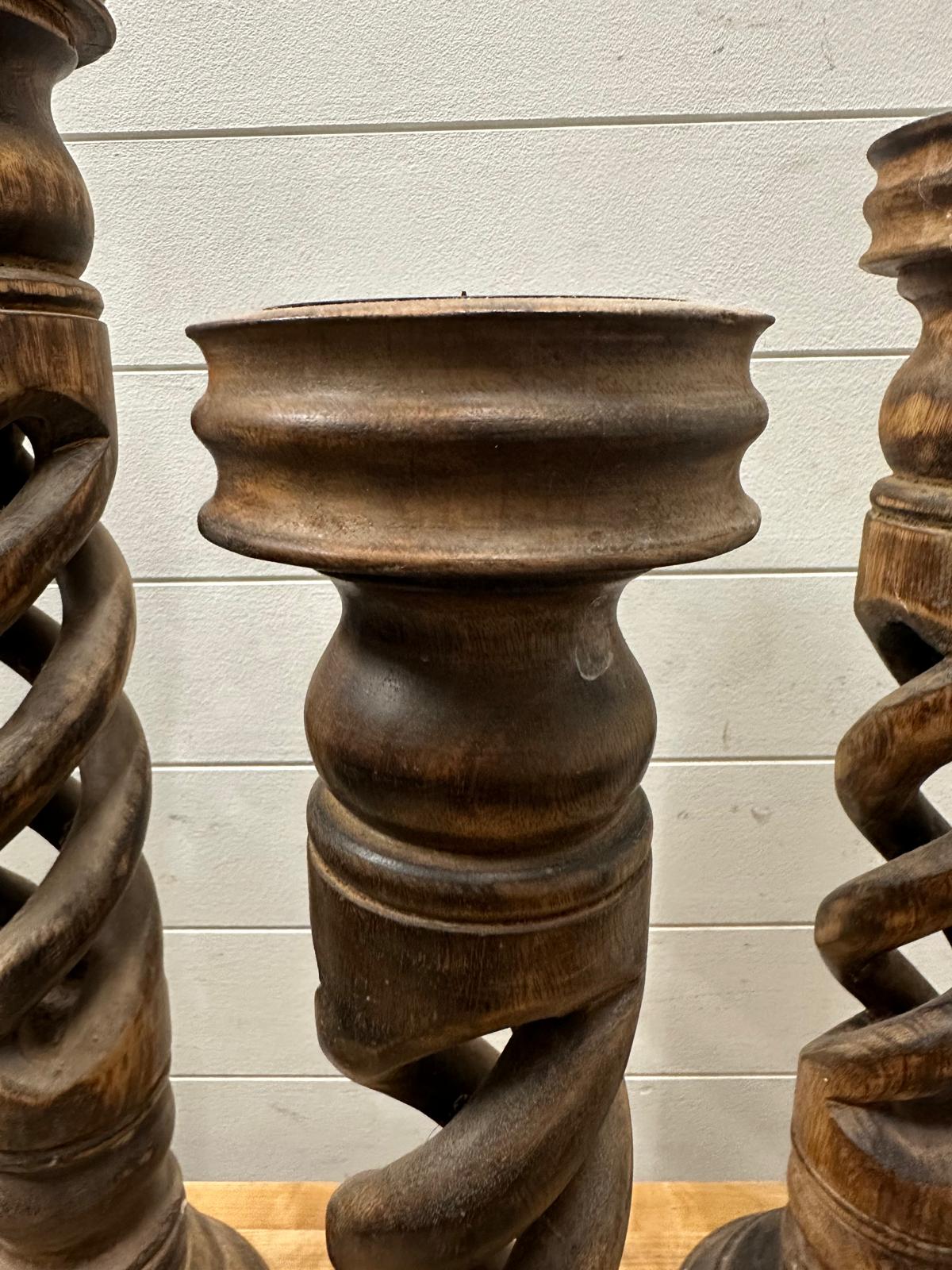 Three turned and twisted wooden candle pillars(Tallest H69cm) - Image 3 of 4