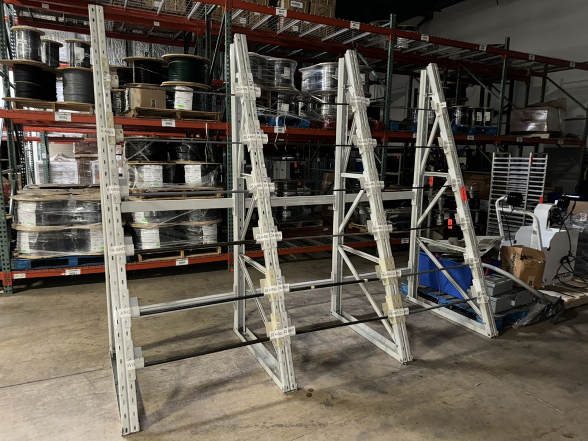 Lot - (3) Sections of Global Reel Racks; 6-Tier, Includes (4) Uprights, (36) Axle Brackets &