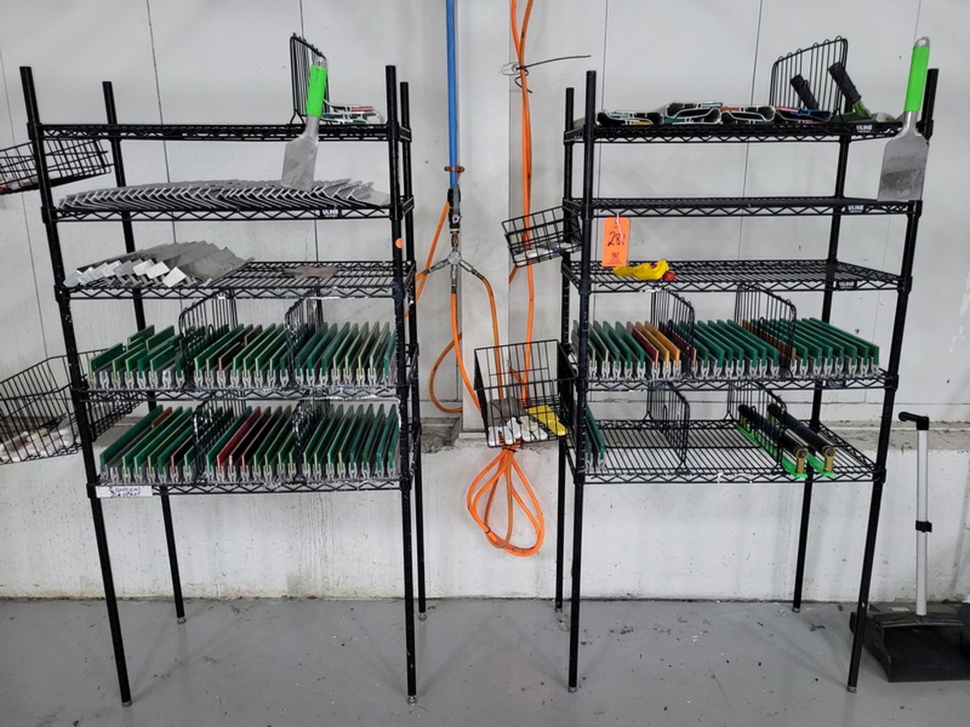 Lot - (2) Wire Racks & Contents with Squeegee's, Flood Bars & Related Tooling