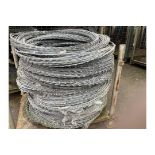 MOD stock 20 + bundles of galvanised razor wire. 1m concertina coils stretches to approx. 40 m