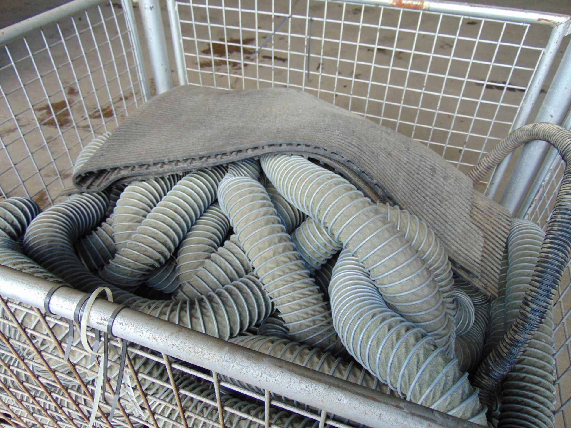 1 x Stillage of Flexible Hoses and Vehicle Floor Mats - Image 2 of 5