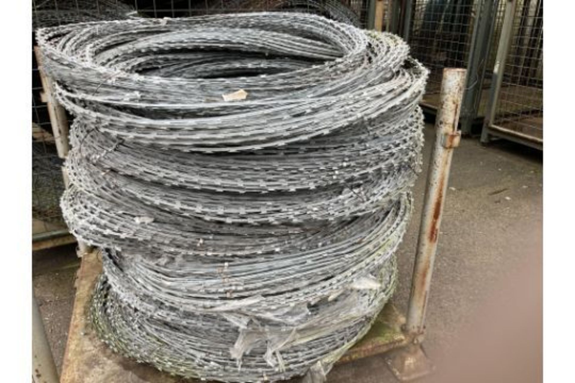 MOD stock 20 + bundles of galvanised razor wire. 1m concertina coils stretches to approx. 40 m