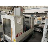 HAAS CNC VMC MODEL VFOE, 20 ATC, CAT 40, 36 IN X 14 IN TABLE, 7,000 RPM, PROGRAMMABLE COOLANT