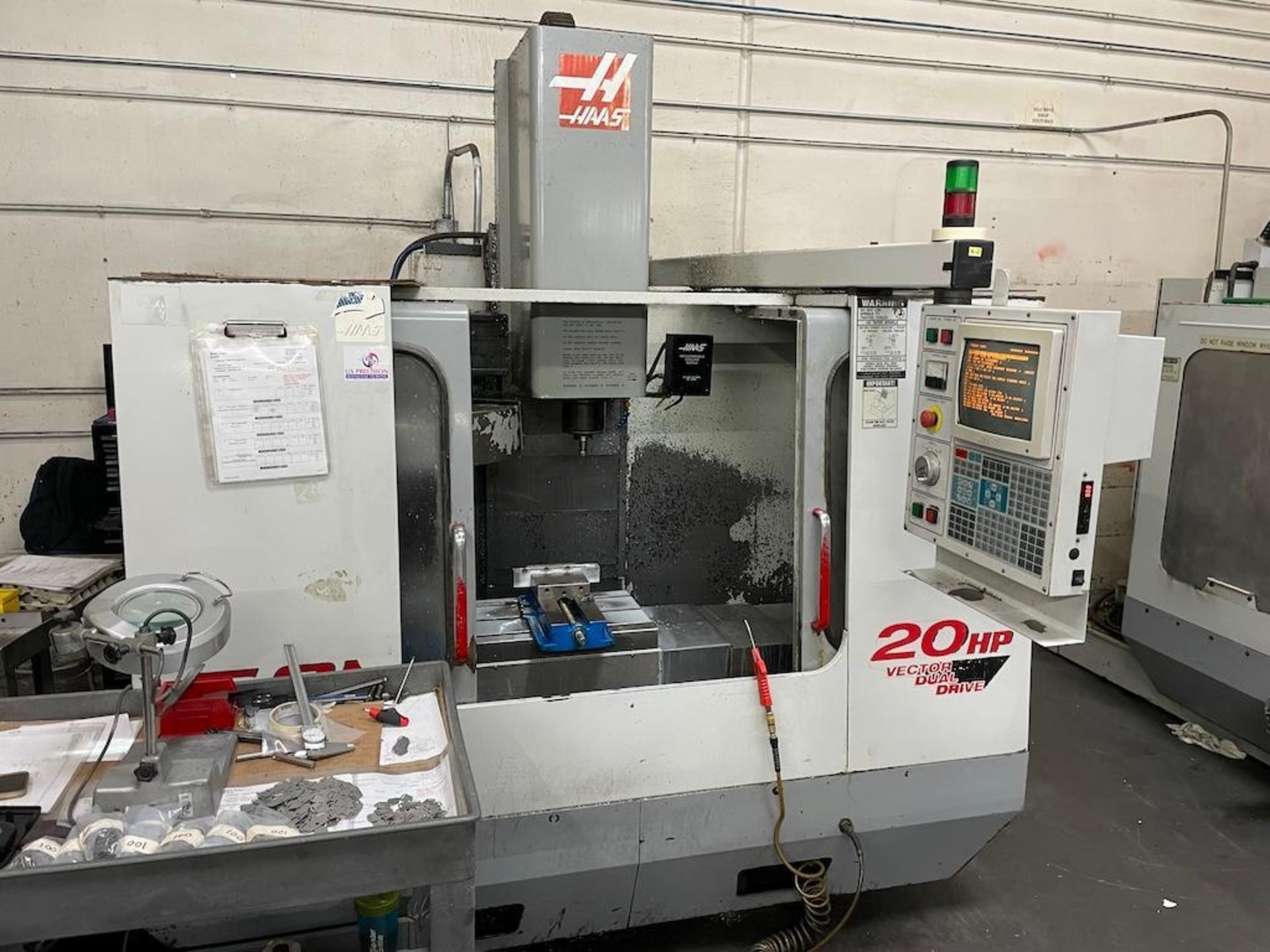 HAAS CNC VMC MODEL VFOE, 20 ATC, CAT 40, 36 IN X 14 IN TABLE, 7,000 RPM, PROGRAMMABLE COOLANT