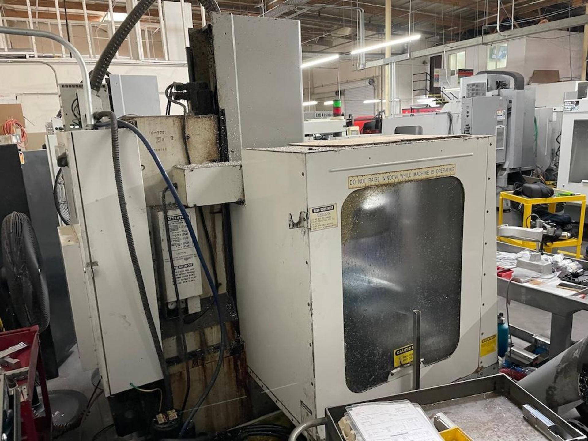 HAAS CNC VMC MODEL VFOE, 20 ATC, CAT 40, 36 IN X 14 IN TABLE, 7,000 RPM, PROGRAMMABLE COOLANT - Image 6 of 8