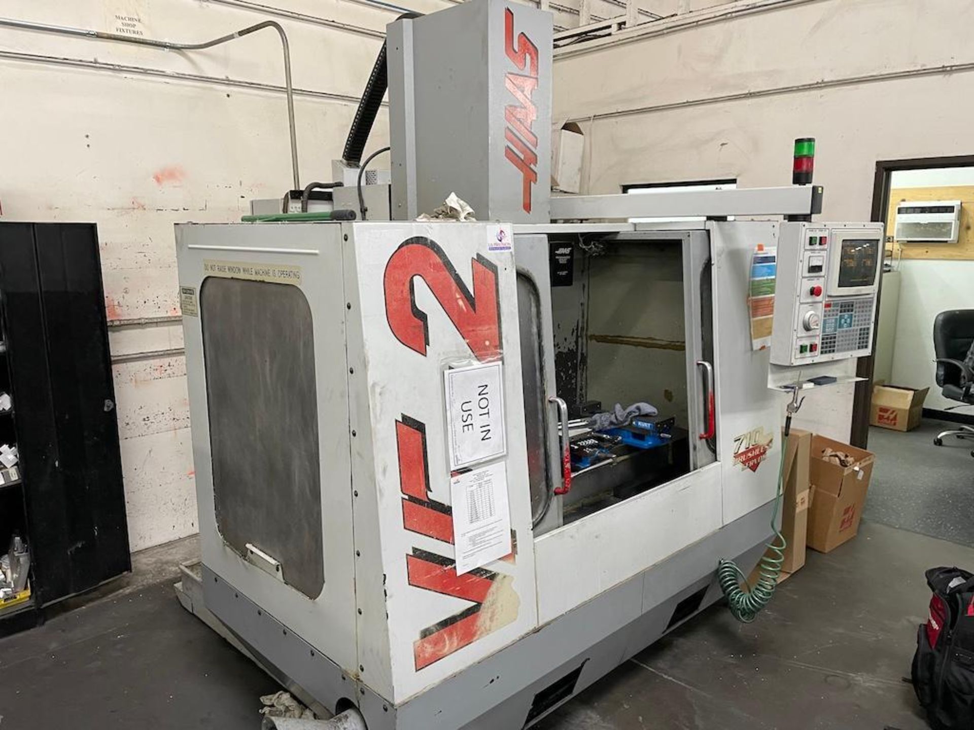 HAAS CNC VMC MODEL VF2, 20 ATC, CAT 40, 36 IN X 14 IN TABLE, 7,000 RPM, PROGRAMMABLE COOLANT NOZZLE,