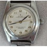 A 1940s Rolex Oyster Perpetual Chronometer 'bubble back' wristwatch with champagne dial, 24mm