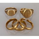 Three 22ct yellow gold wedding bands, two cut, other size L, 4mm, 14.7g and two 18ct yellow gold 