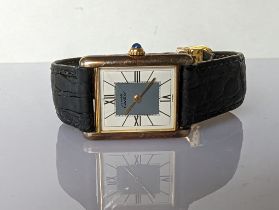A Must de Cartier Tank wristwatch with quartz movement, the rectangular two-tone dia