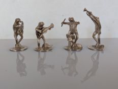 A novelty set of four silver menu holders in the form of a frog band 