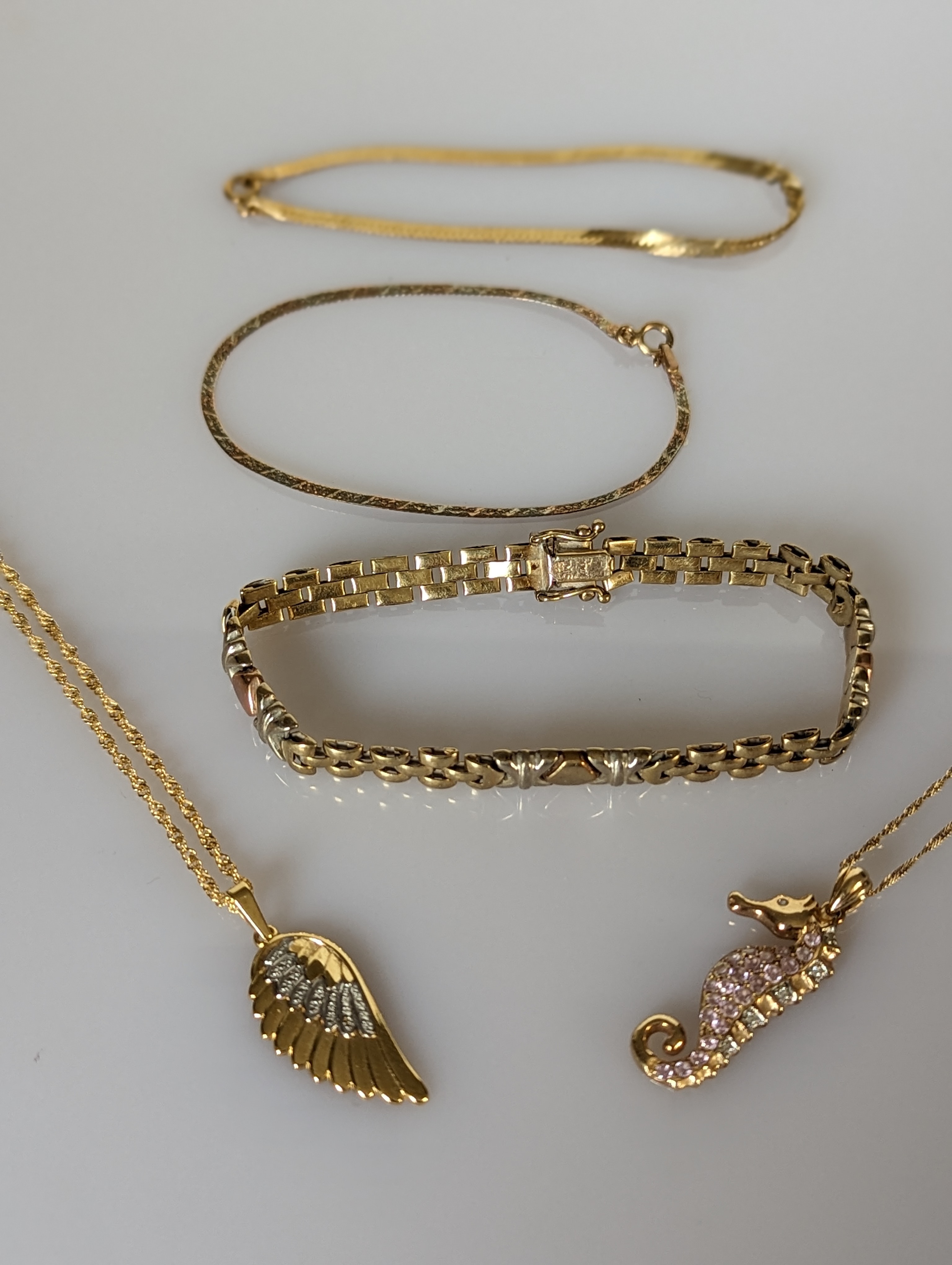 An Italian yellow gold brick-link bracelet, 16mm, hallmarked; two other snake-link bracelets - Image 2 of 3