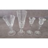 A set of eight Waterford Crystal wine or water glasses, 16 cm H and six champagne flutes, 20.5 cm H