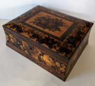 A Tunbridge Ware oblong box of rectangular form, the cushion lid with inset floral mosaic