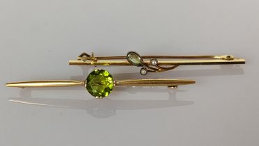 A peridot and yellow gold brooch, Egyptian hallmark for 18ct, 53mm
