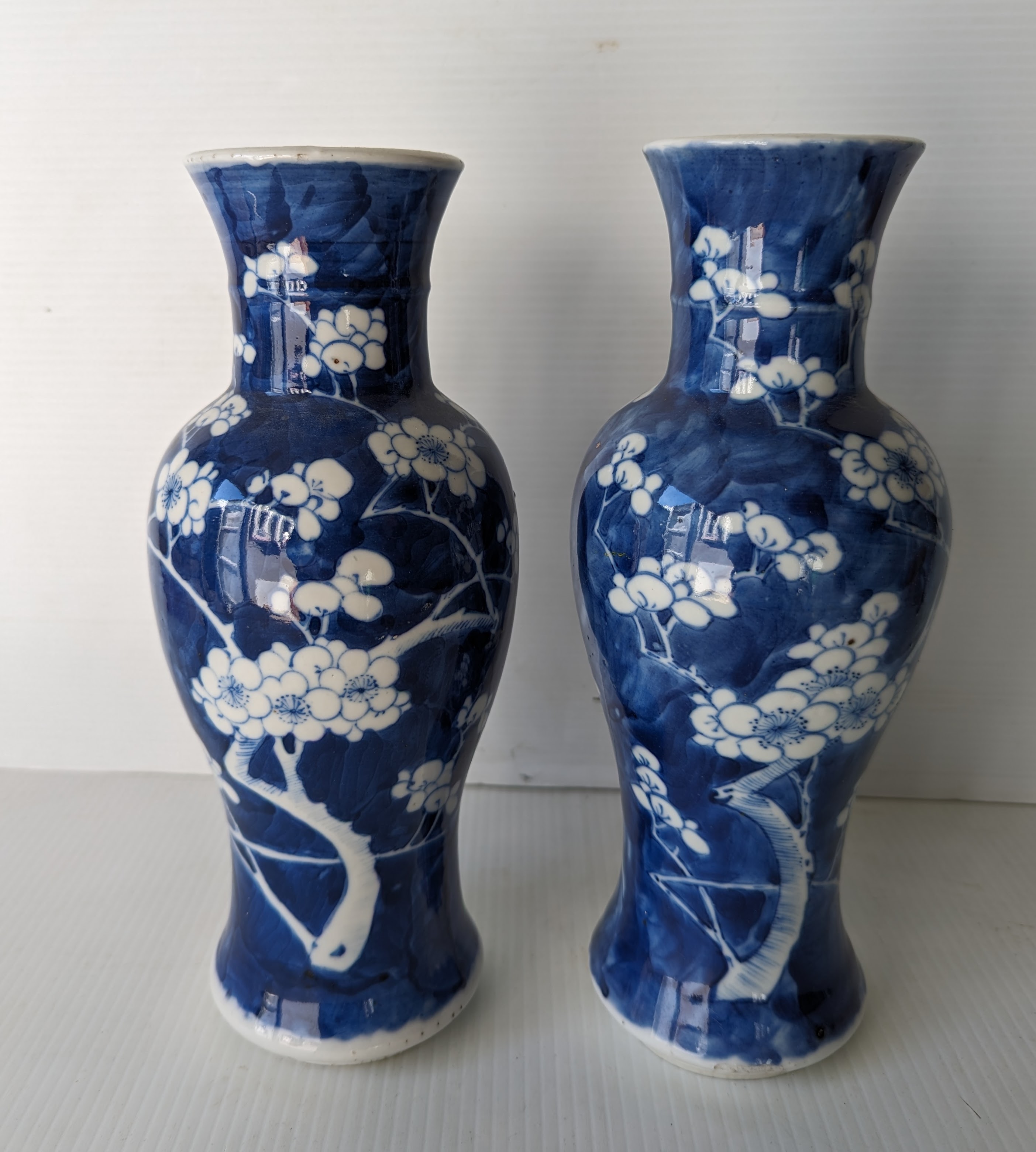 A pair of late 19th century Chinese blue and white porcelain vases with prunus decoration  - Image 2 of 6