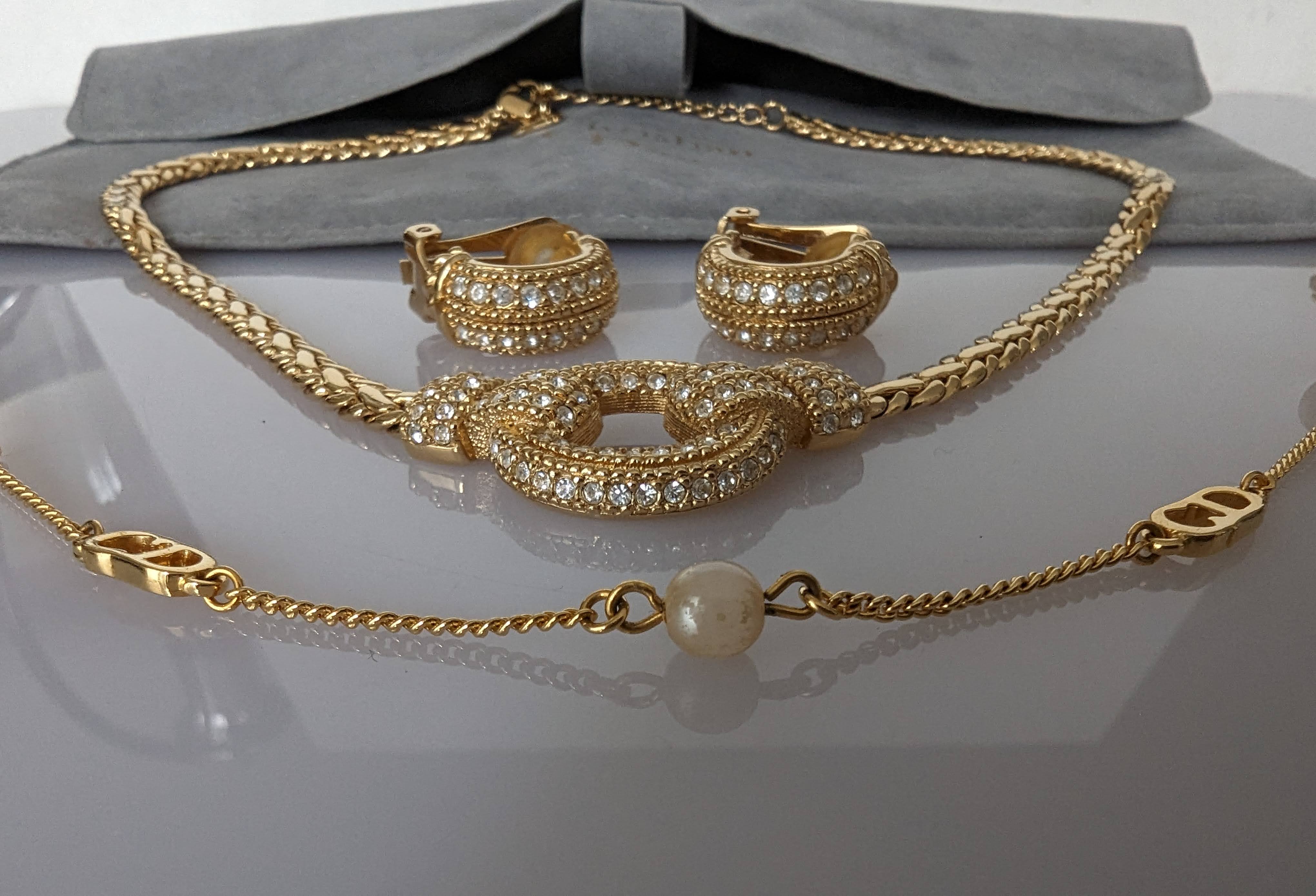 A Christian Dior gold plated necklace, 43 cm, with matching earrings, with original pouches