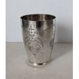 A continental silver beaker with fruit and foliate etched decoration, 10 cm H, 137g