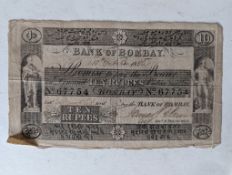 A Bank of Bombay Ten Rupees note dated 1856 with serial no. 67754, some pinholes