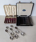 A cased set of six silver coffee spoon by Viners, Sheffield; five silver tea spoons with crested ter