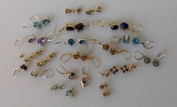 An assortment of fifteen pairs (and one odd pair) of gem-set earrings on 9ct white and yellow gold