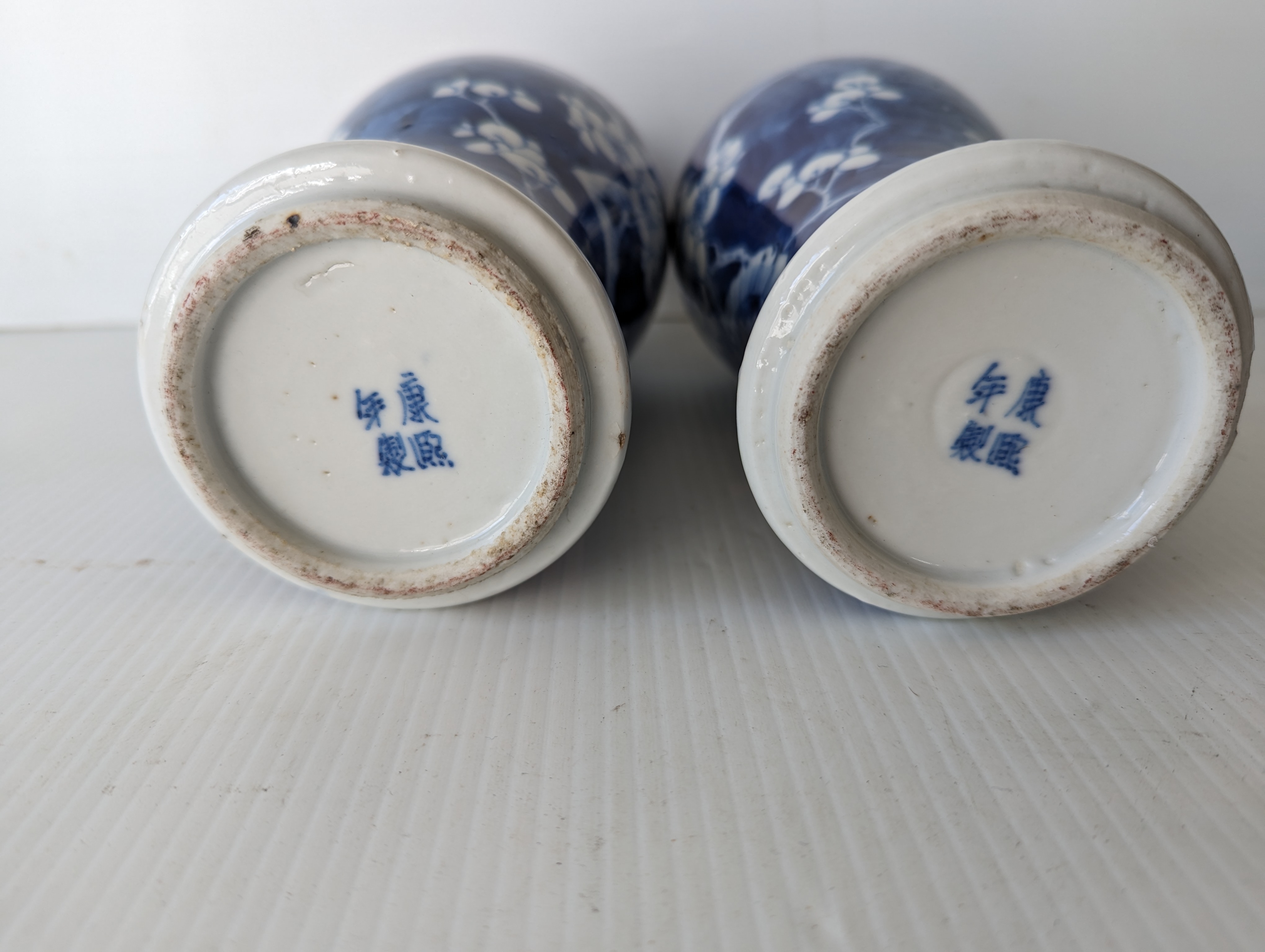 A pair of late 19th century Chinese blue and white porcelain vases with prunus decoration  - Image 3 of 6
