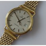 A 1980s Omega Seamaster wristwatch with later gold mesh bracelet strap, champagne dial